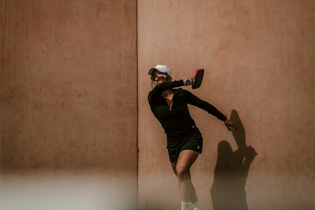 Woman playing tennis outdoors